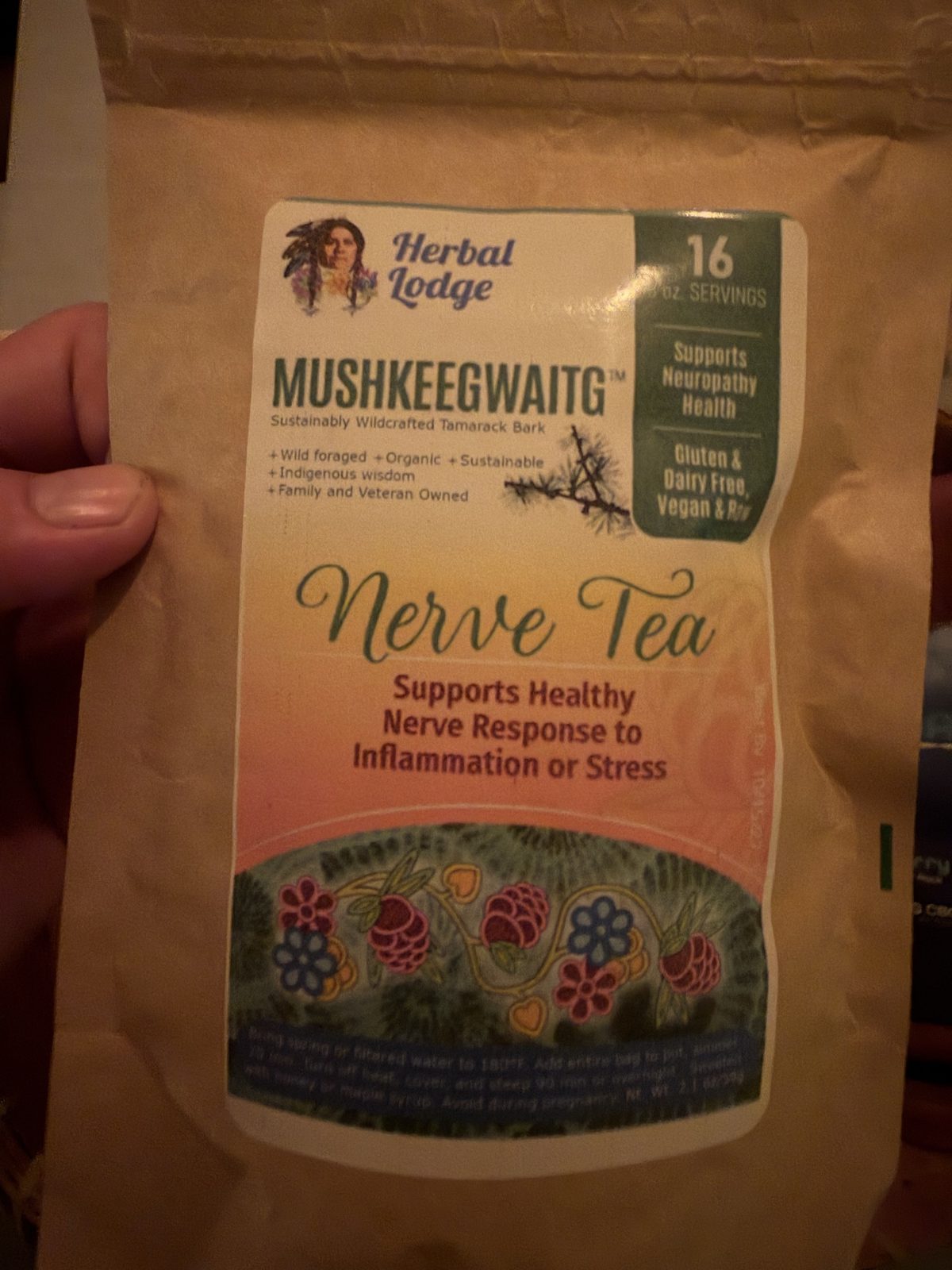 Mushkeegwaitg tamarack bark nerve tea package held in hand